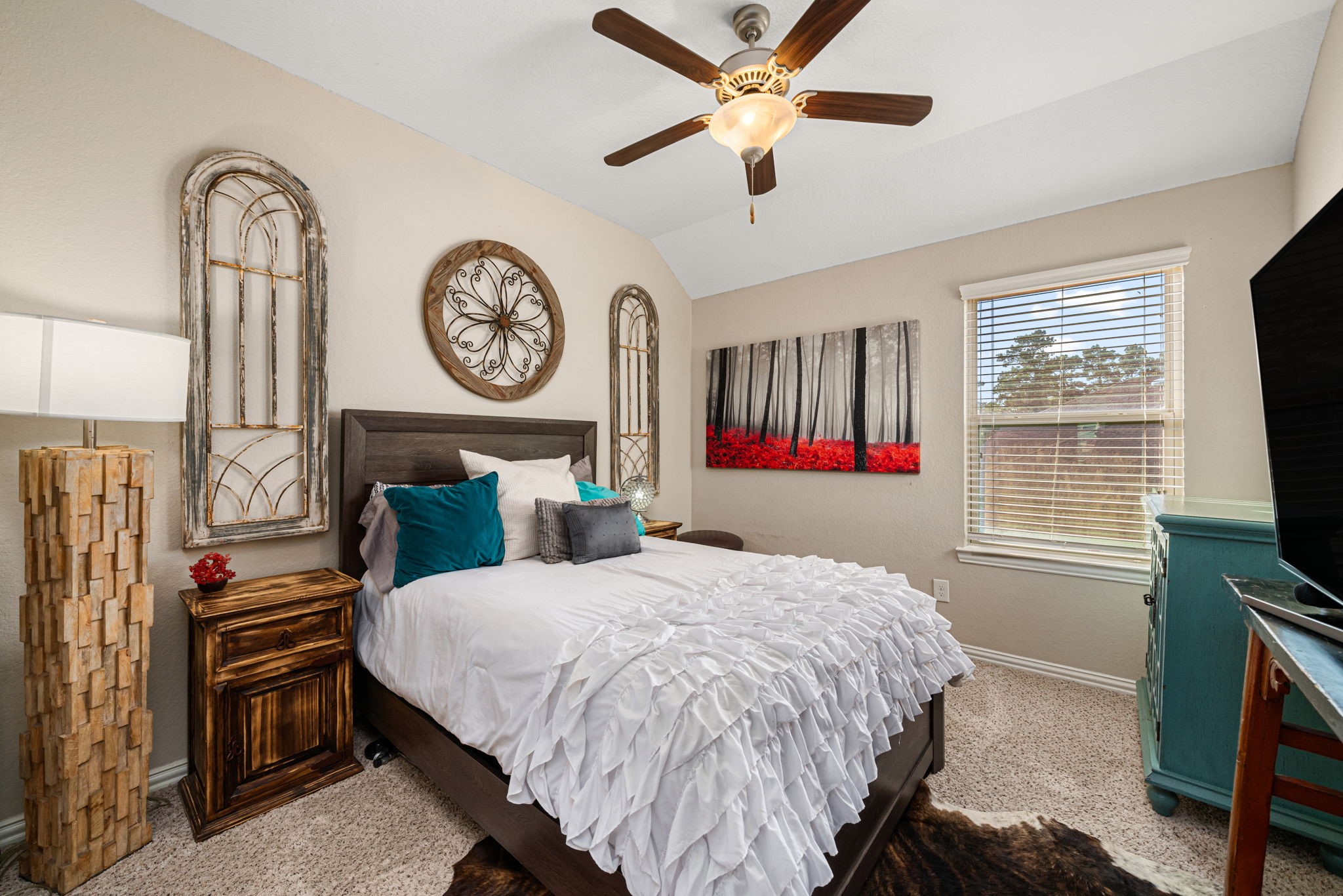 931 South Chamfer Way Crosby, TX 77532 - Photo 36 of 40 a bedroom with a bed and a flat tv screen on the dresser