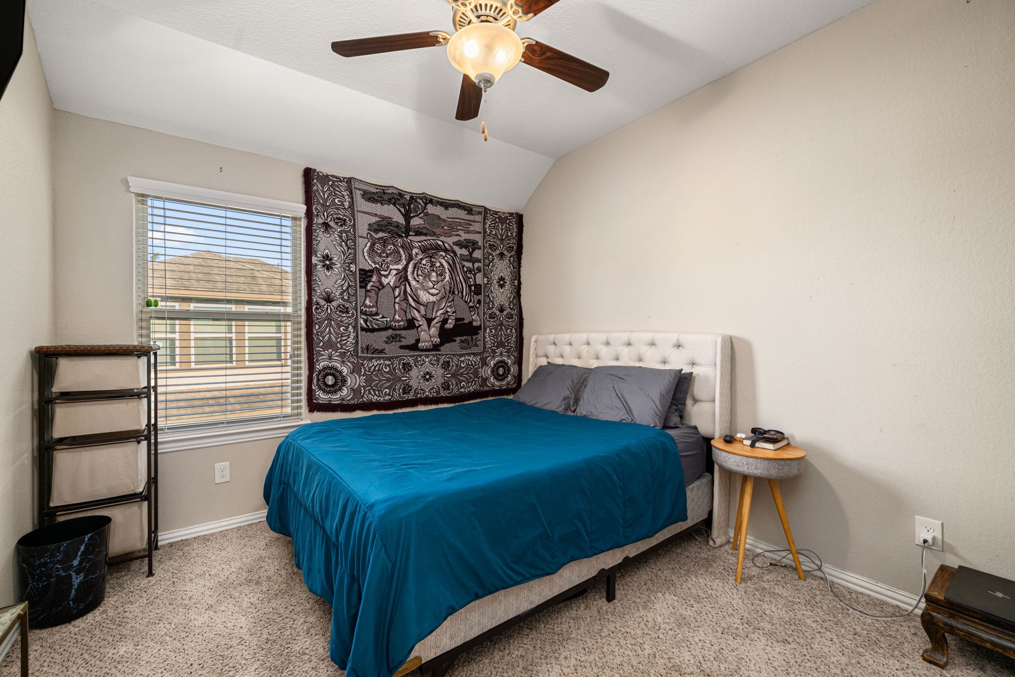 931 South Chamfer Way Crosby, TX 77532 - Photo 39 of 40 a bedroom with a bed and a chandelier