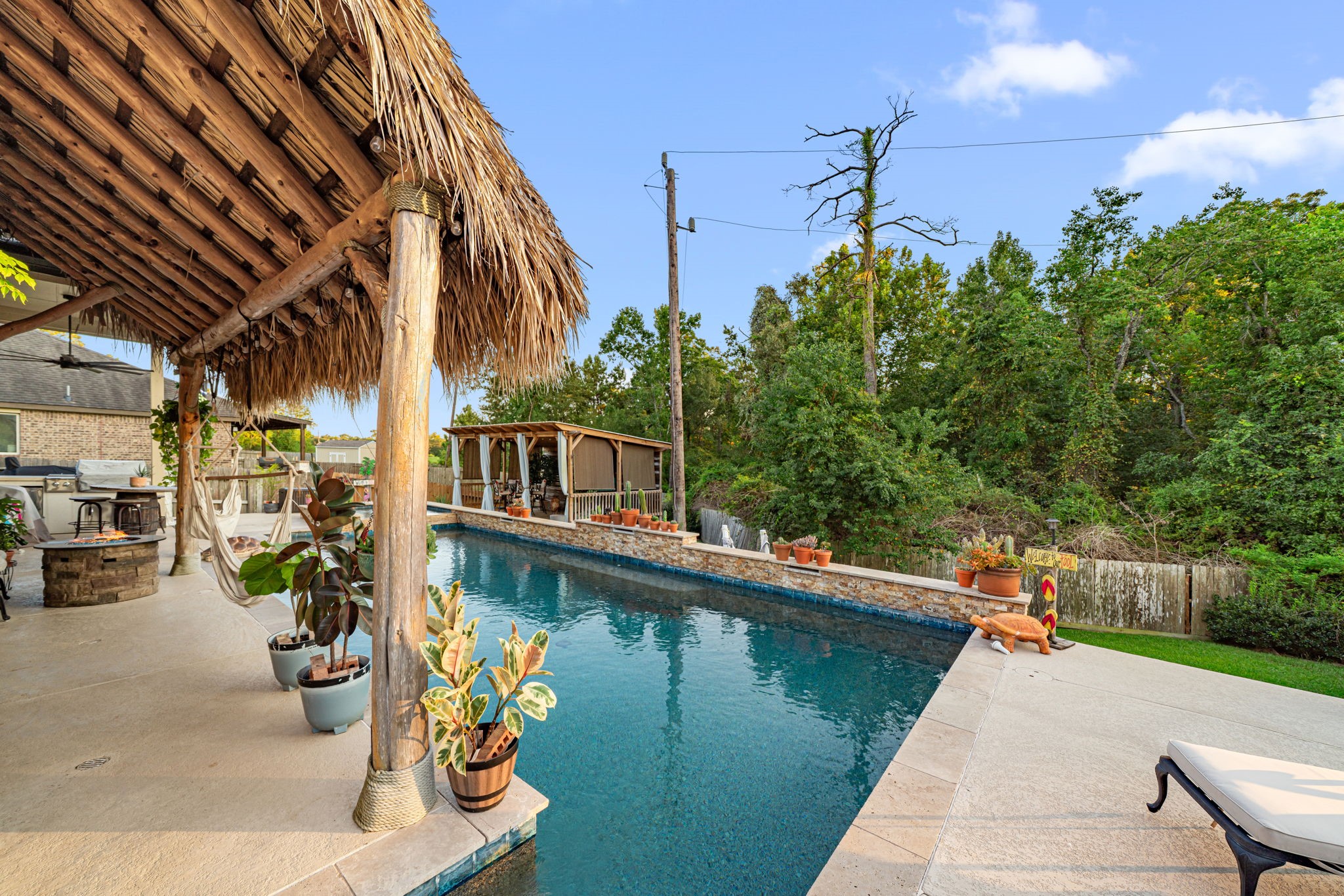 931 South Chamfer Way Crosby, TX 77532 - Photo 8 of 40 a view of a lake with a patio