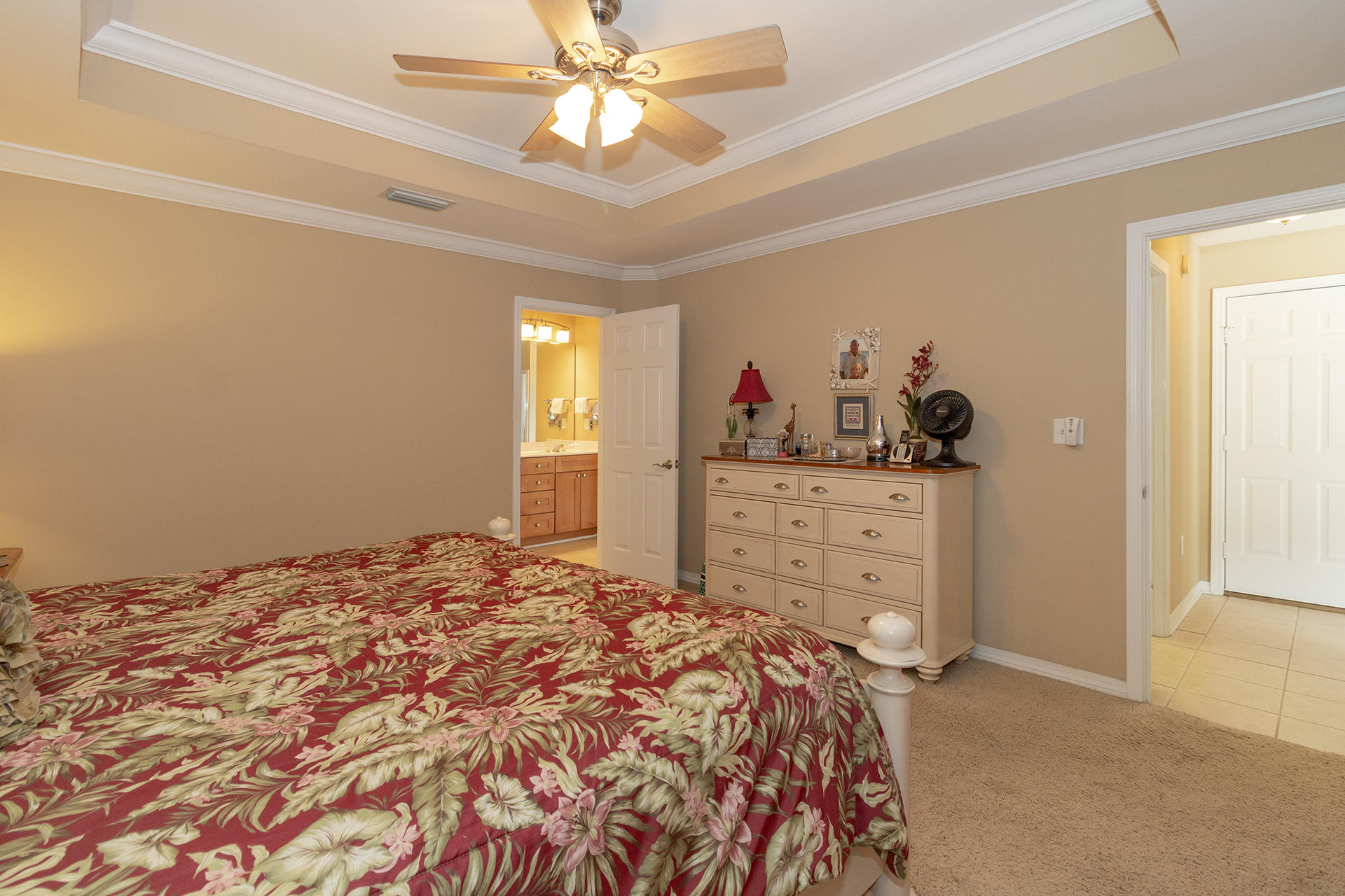 160 Pritchard Road Miramar Beach, FL 32550 - Photo 14 of 36 a bedroom with a bed and a chandelier