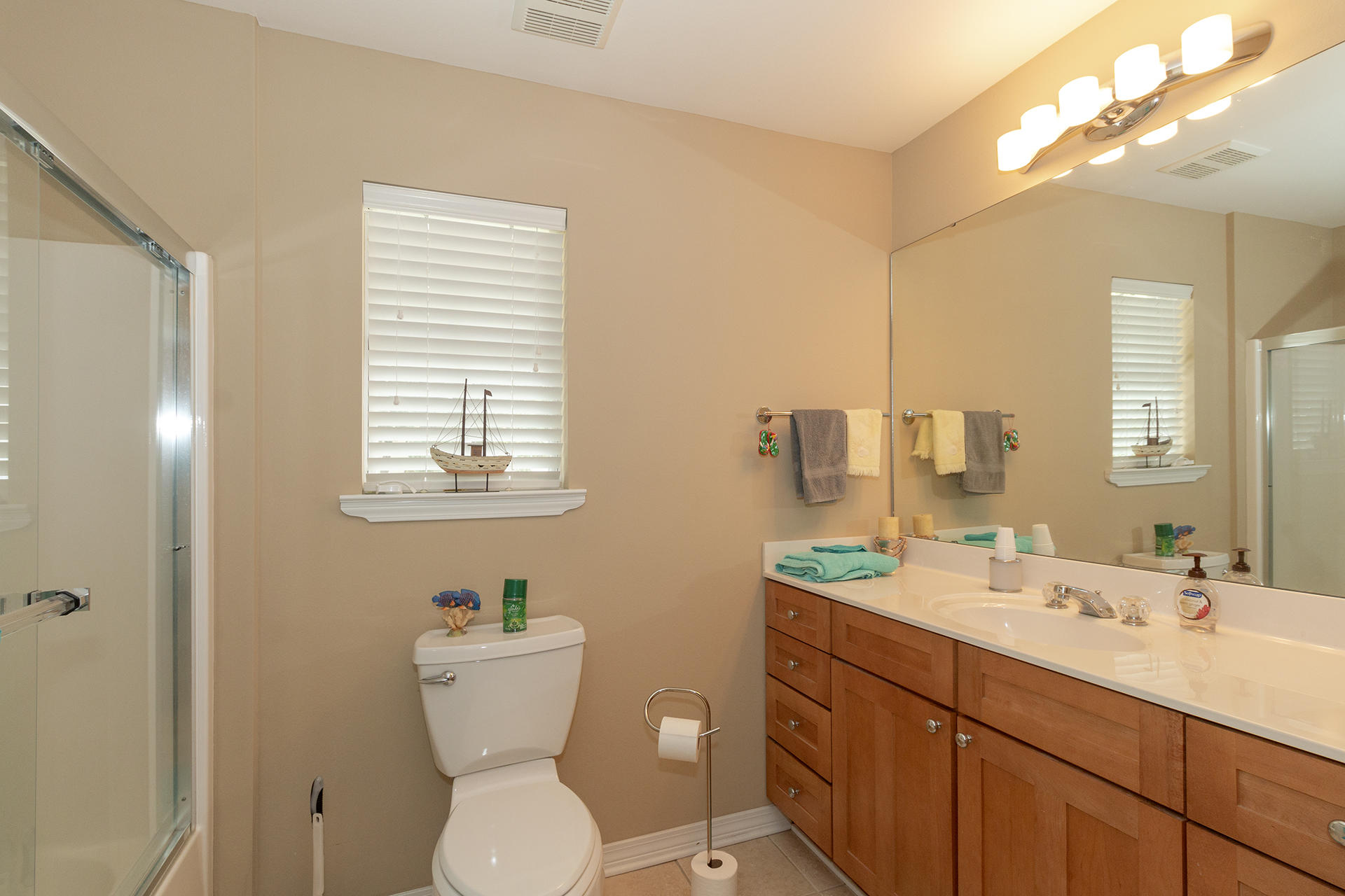 160 Pritchard Road Miramar Beach, FL 32550 - Photo 31 of 36 a bathroom with a toilet sink and mirror
