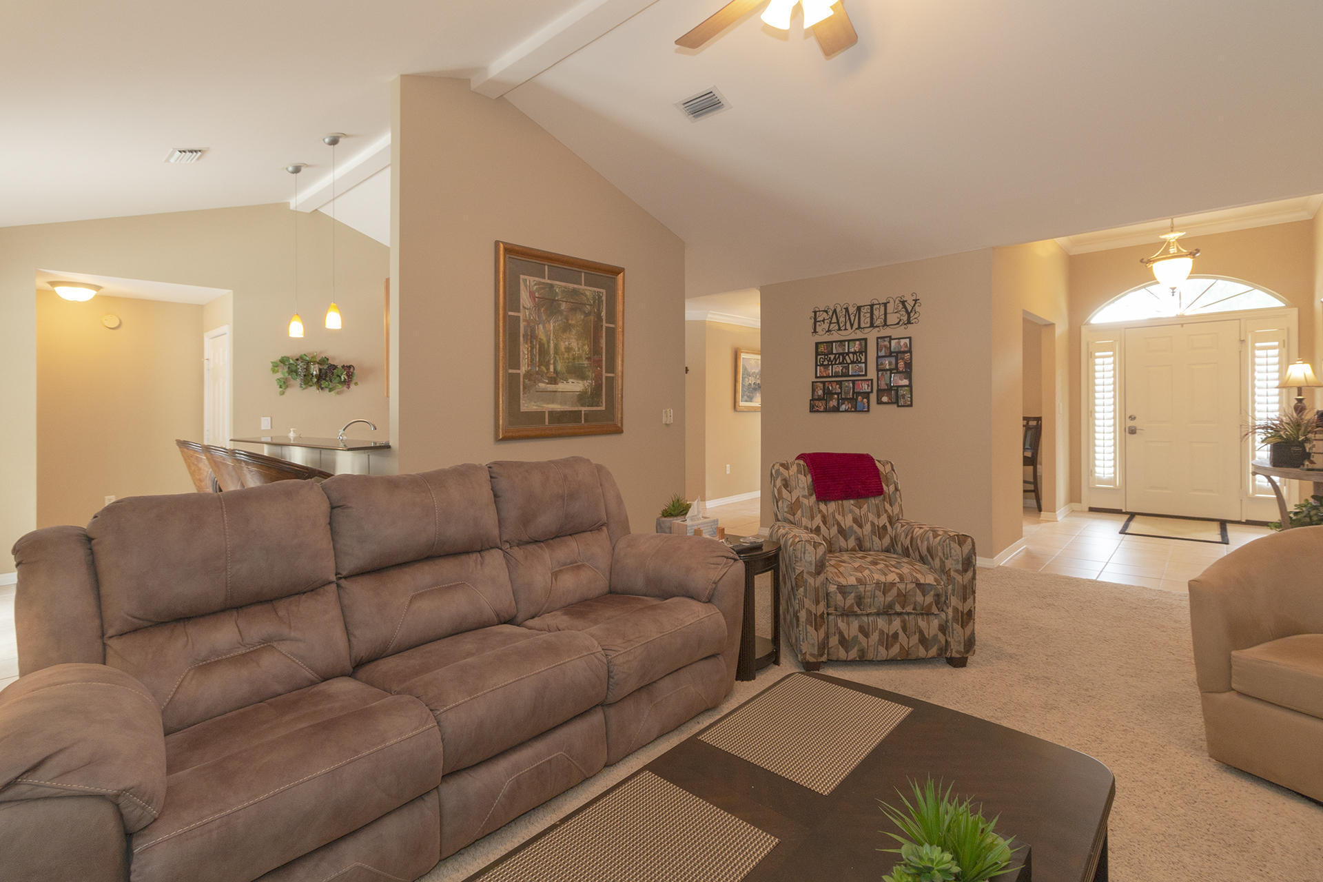 160 Pritchard Road Miramar Beach, FL 32550 - Photo 6 of 36 a living room with furniture and a chandelier