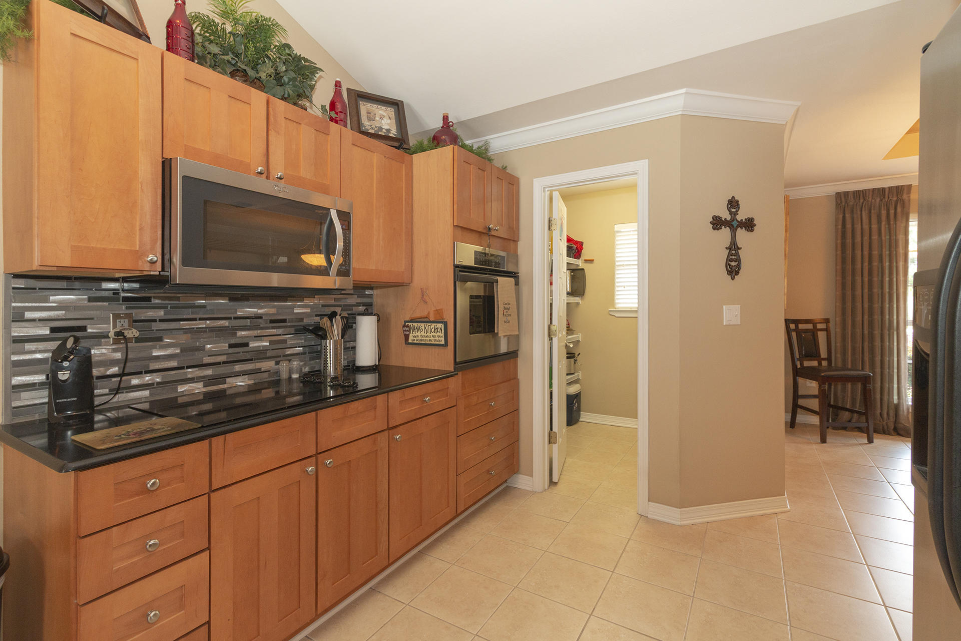 160 Pritchard Road Miramar Beach, FL 32550 - Photo 10 of 36 a kitchen with stainless steel appliances granite countertop a refrigerator and microwave