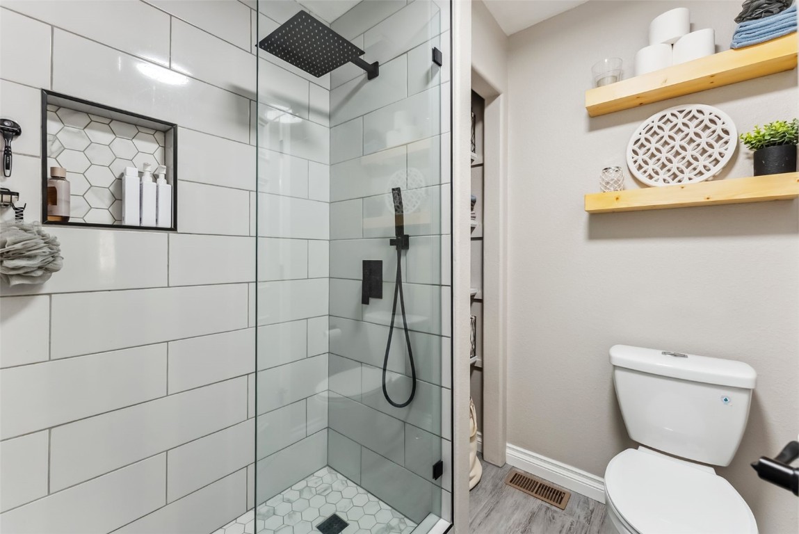 109 Old Corral Road Bailey, CO 80421 - Photo 24 of 50 a bathroom with a toilet and a shower