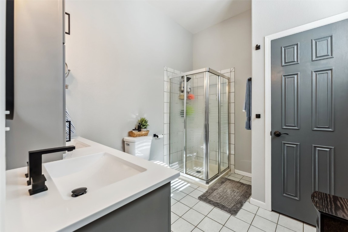 109 Old Corral Road Bailey, CO 80421 - Photo 30 of 50 a bathroom with a sink and a mirror