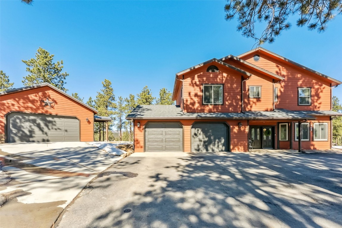 109 Old Corral Road Bailey, CO 80421 - Photo 45 of 50 a front view of a house