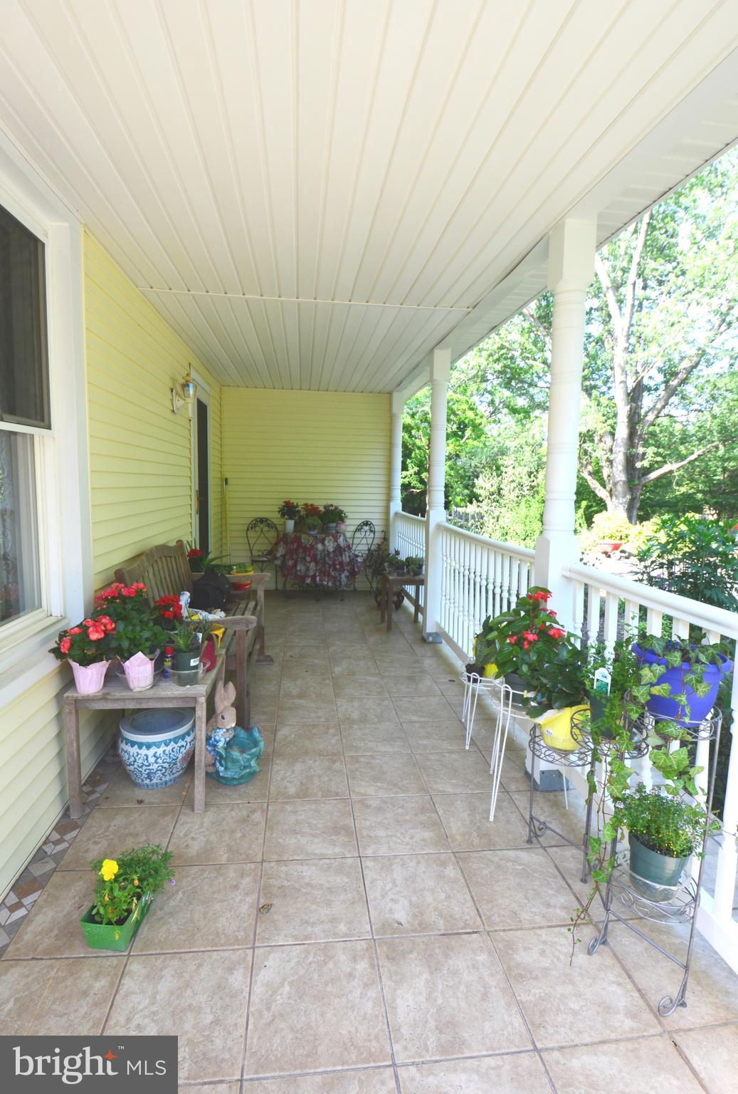2165 Woodview Road Finksburg, MD 21048 - Photo 12 of 70 Tile and pvc railing. Covered porch is 20 x 8 foot
