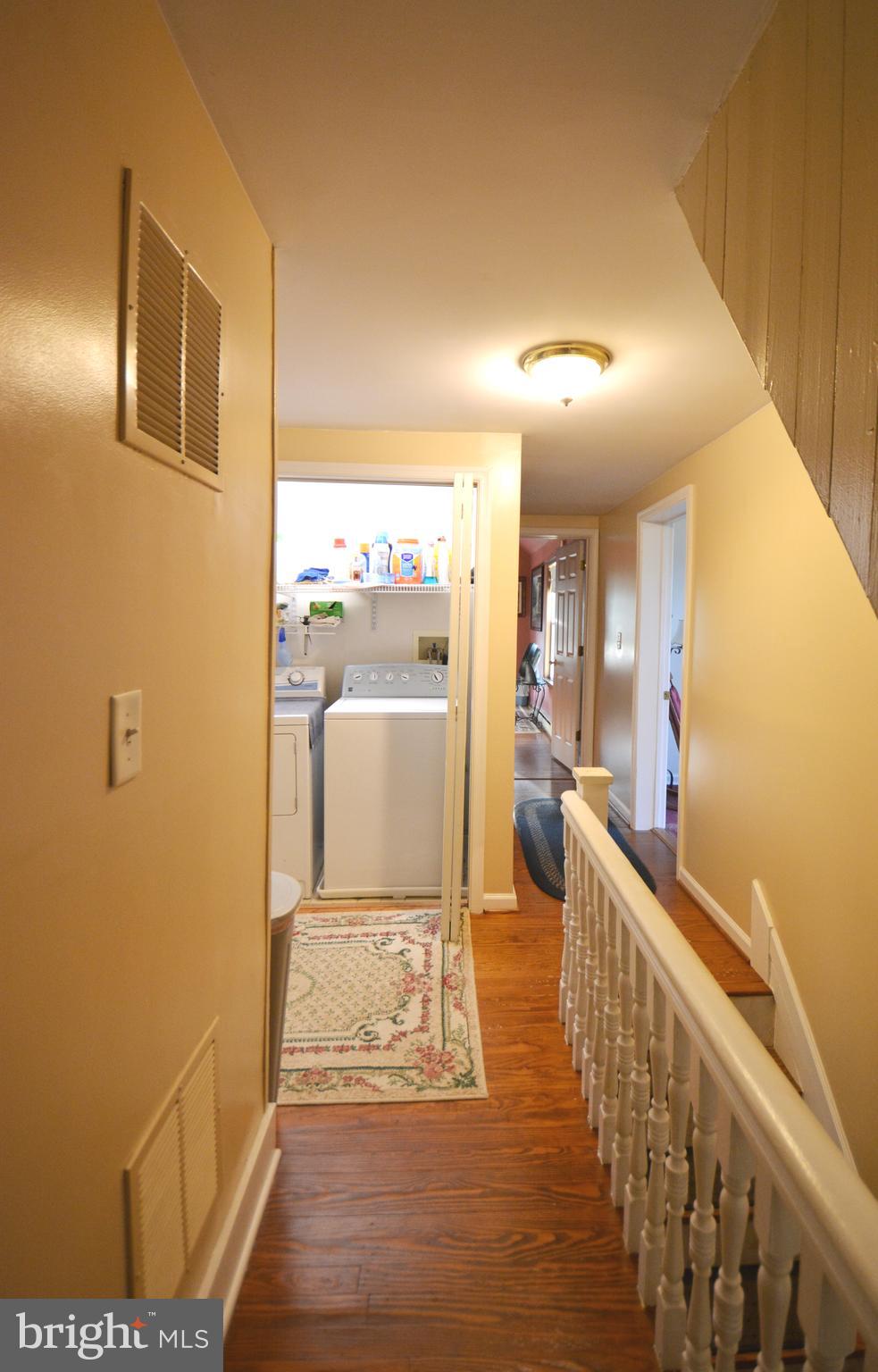 2165 Woodview Road Finksburg, MD 21048 - Photo 30 of 70 Upper level hallway , laundry area 6 x 3 ft w/ drs