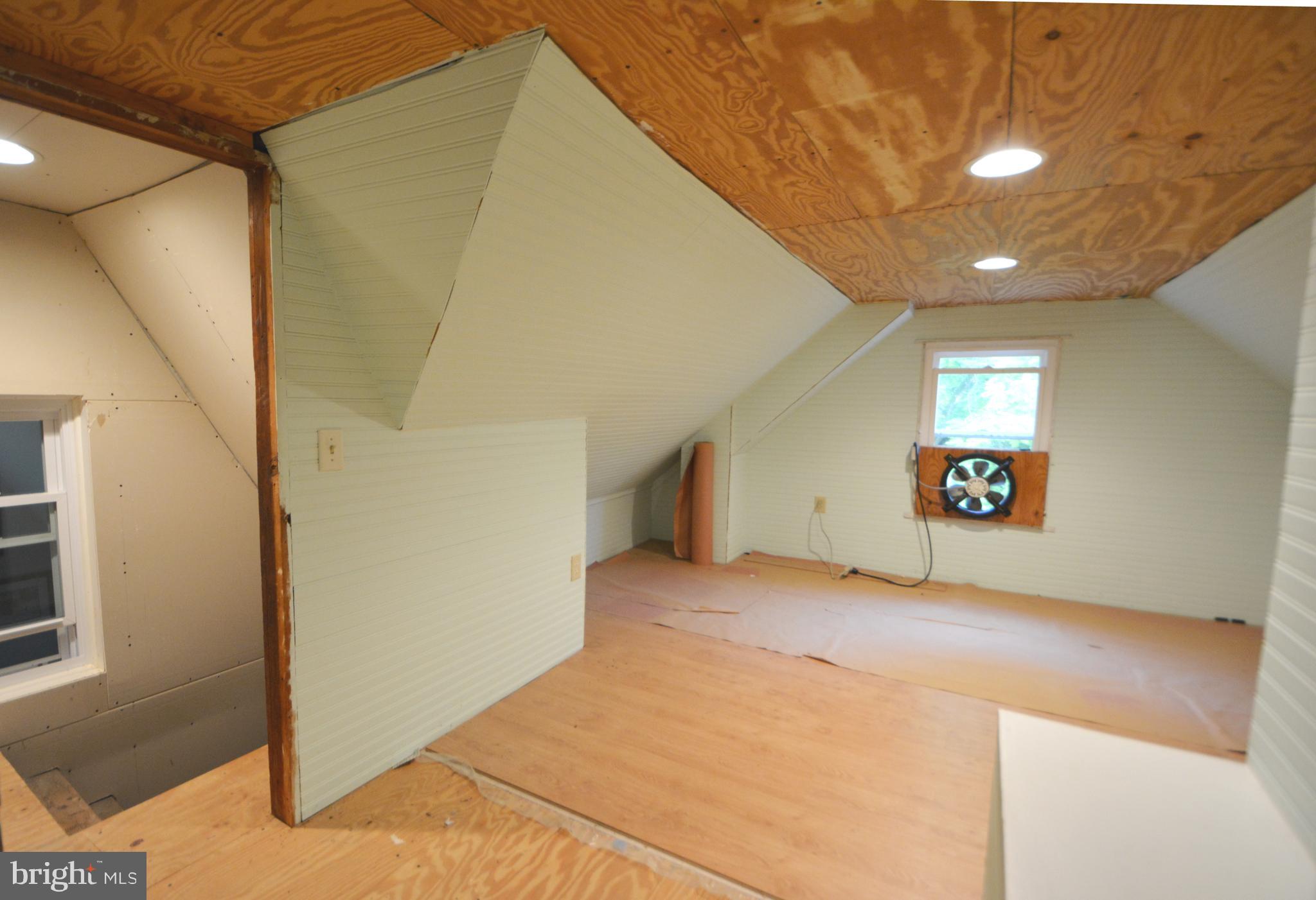 2165 Woodview Road Finksburg, MD 21048 - Photo 48 of 70 Attic, new laminate floor started, supplies in box