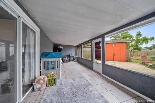a lobby with furniture and garden