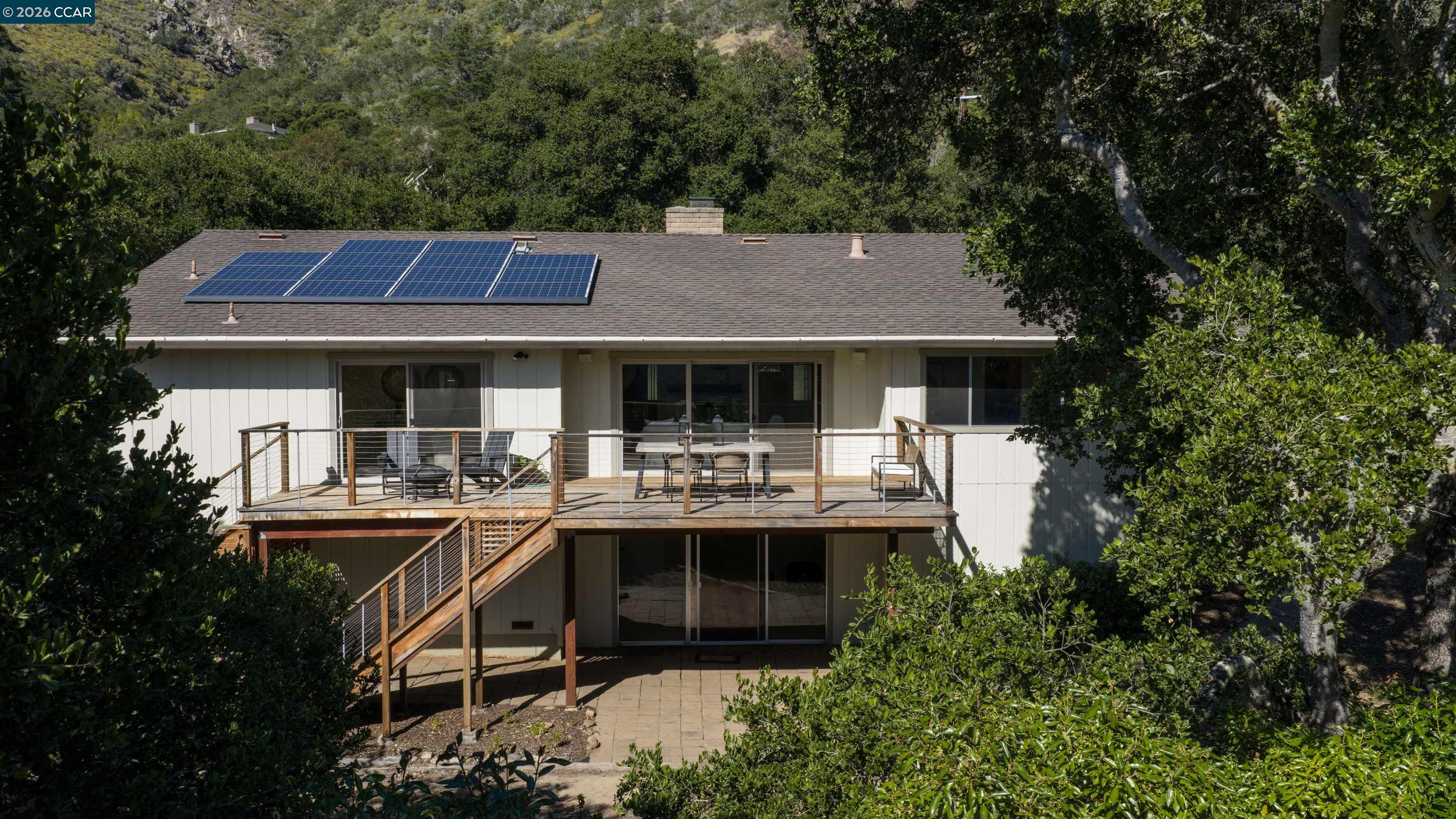 12 Marquard Road Carmel Valley, CA 93924 - Photo 32 of 36 a front view of a house with swimming pool and sitting space