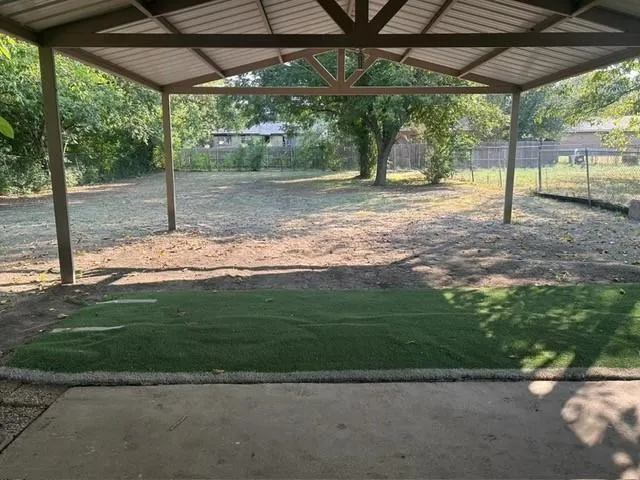 a view of a yard with a sink