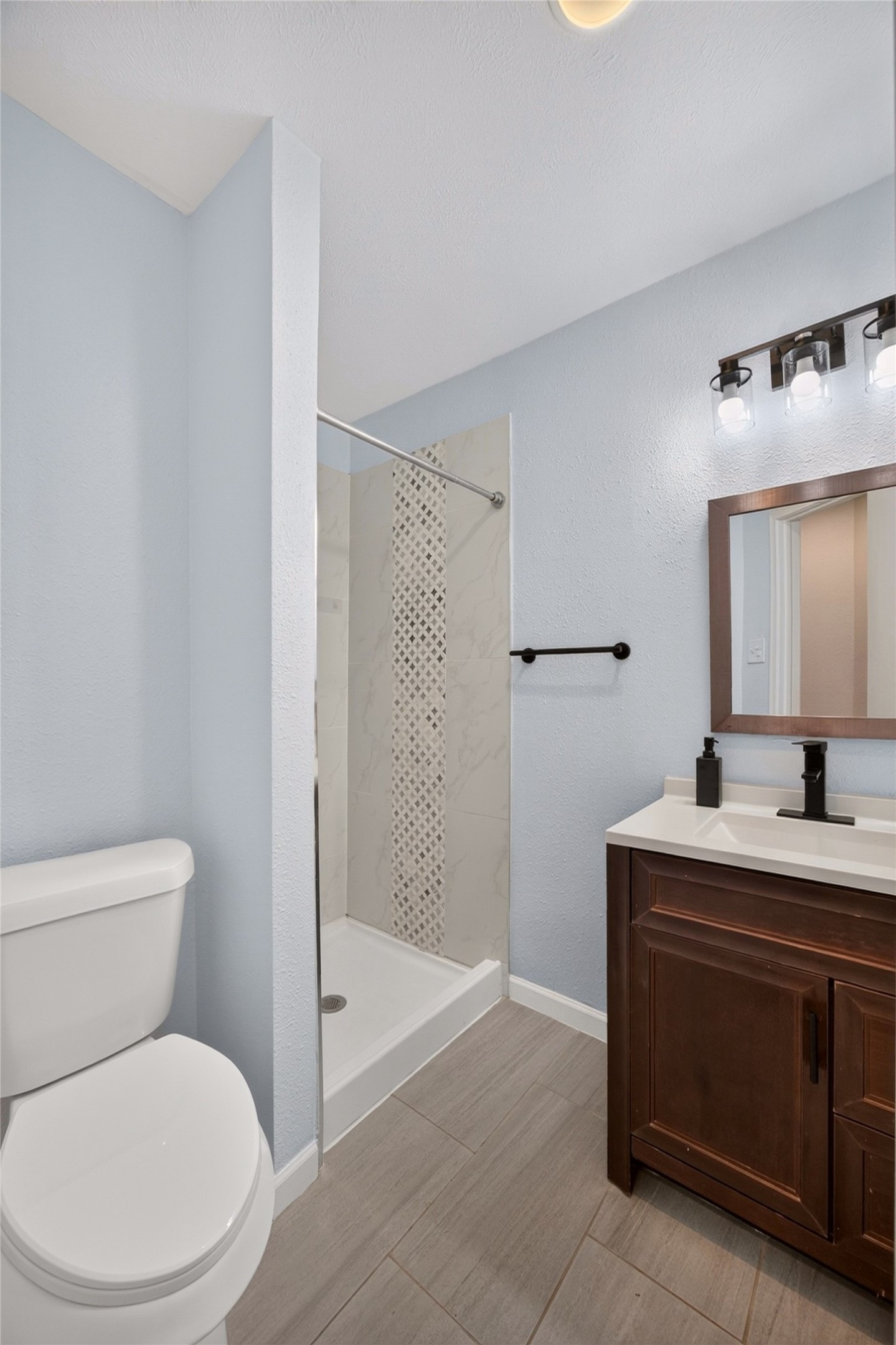 8002 Lichen Lane Spring, TX 77379 - Photo 34 of 50 The first of the full bathrooms upstairs.