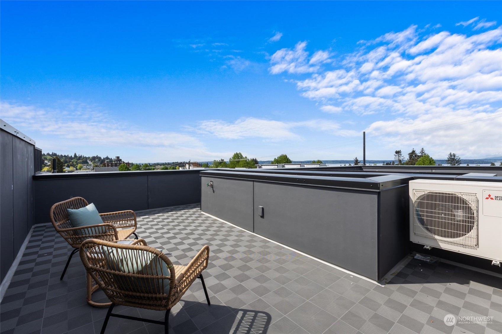 4211 Southwest Raymond Street Seattle, WA 98136 - Photo 15 of 27 a view of a chair and table on the terrace