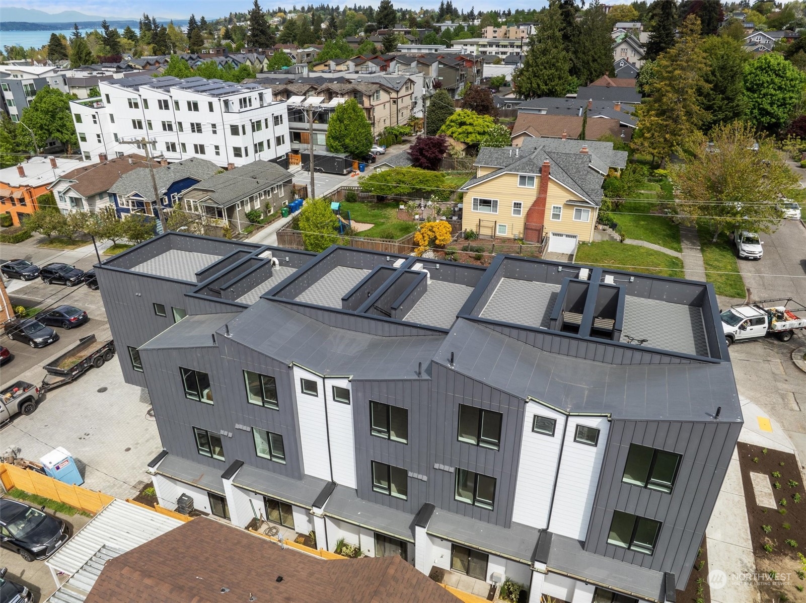 4211 Southwest Raymond Street Seattle, WA 98136 - Photo 19 of 27 an aerial view of residential houses with outdoor space