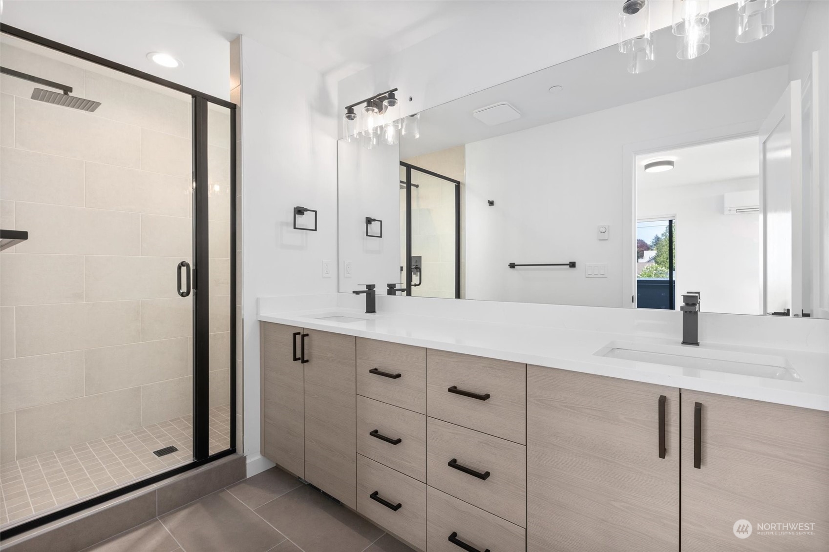 4211 Southwest Raymond Street Seattle, WA 98136 - Photo 10 of 27 a bathroom with a granite countertop sink mirror and double