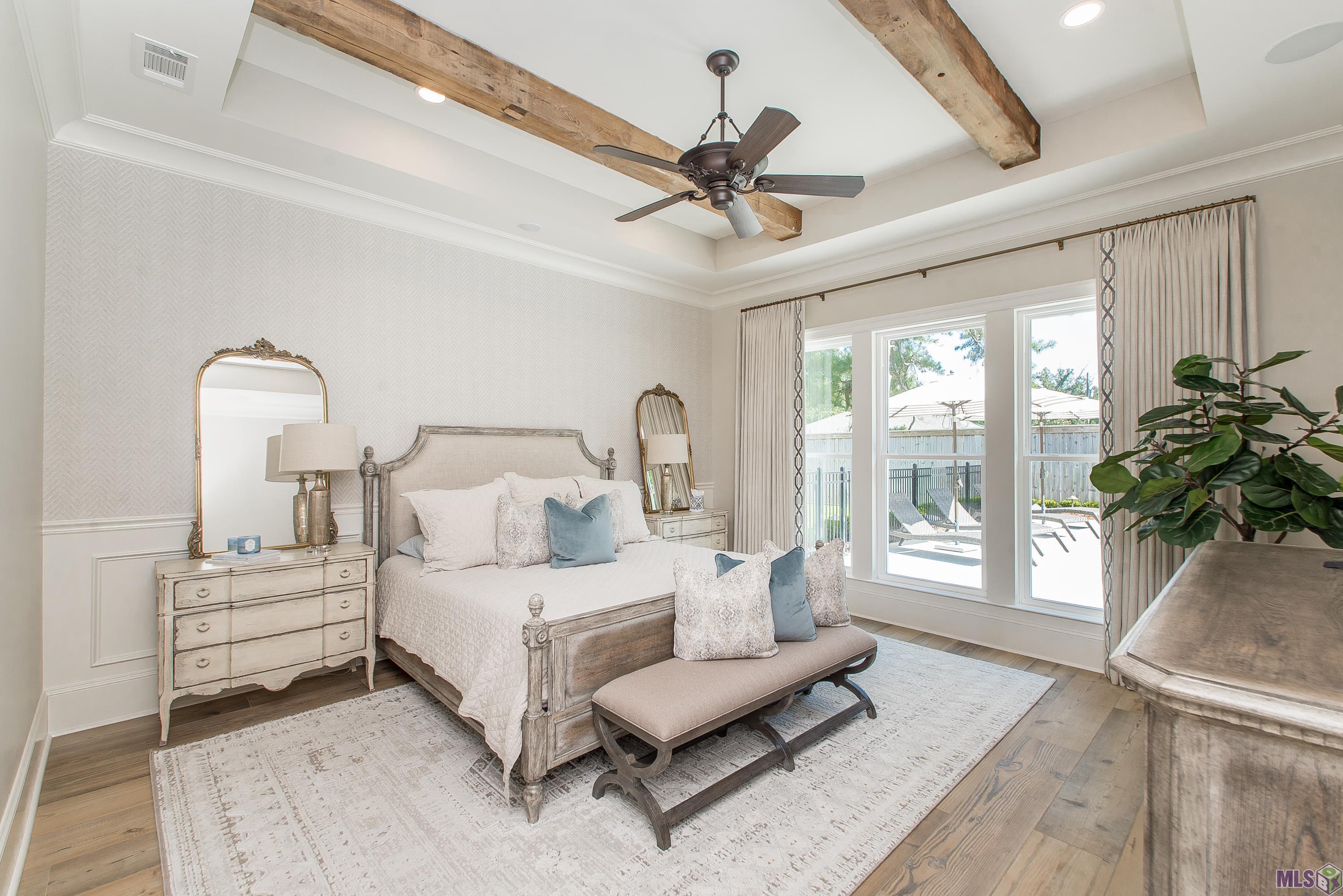 9984 Forrest Delatte Road Denham Springs, LA 70726 - Photo 24 of 59 Primary Bedroom With Antique Pine Beams