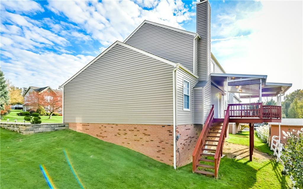 102 Ridgeview Circle Glenshaw, PA 15116 - Photo 21 of 25 Check out the newer vinyl siding and amazing covered rear deck!