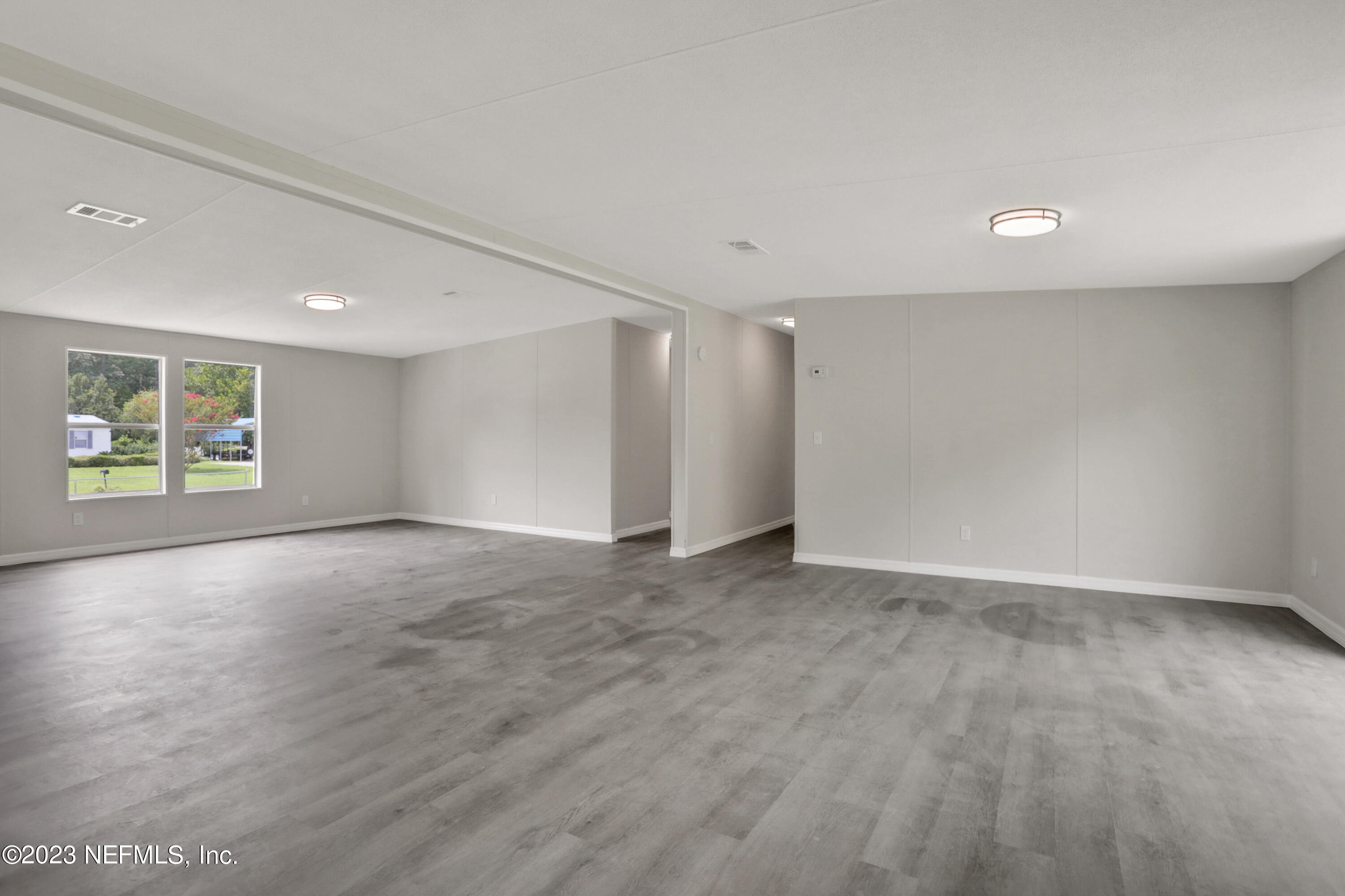 10765 Boddens Road Jacksonville, FL 32219 - Photo 14 of 39 a view of an empty room with a window