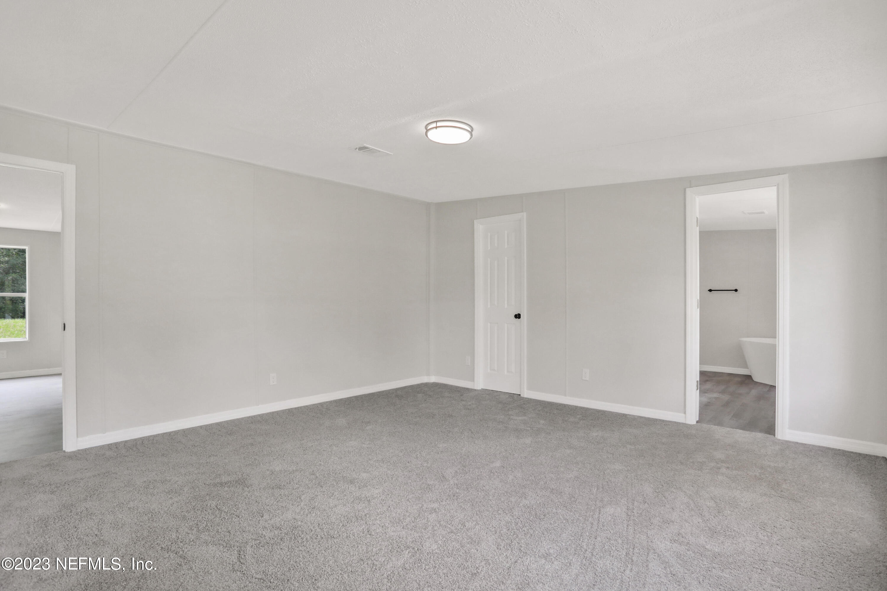 10765 Boddens Road Jacksonville, FL 32219 - Photo 26 of 39 a view of an empty room