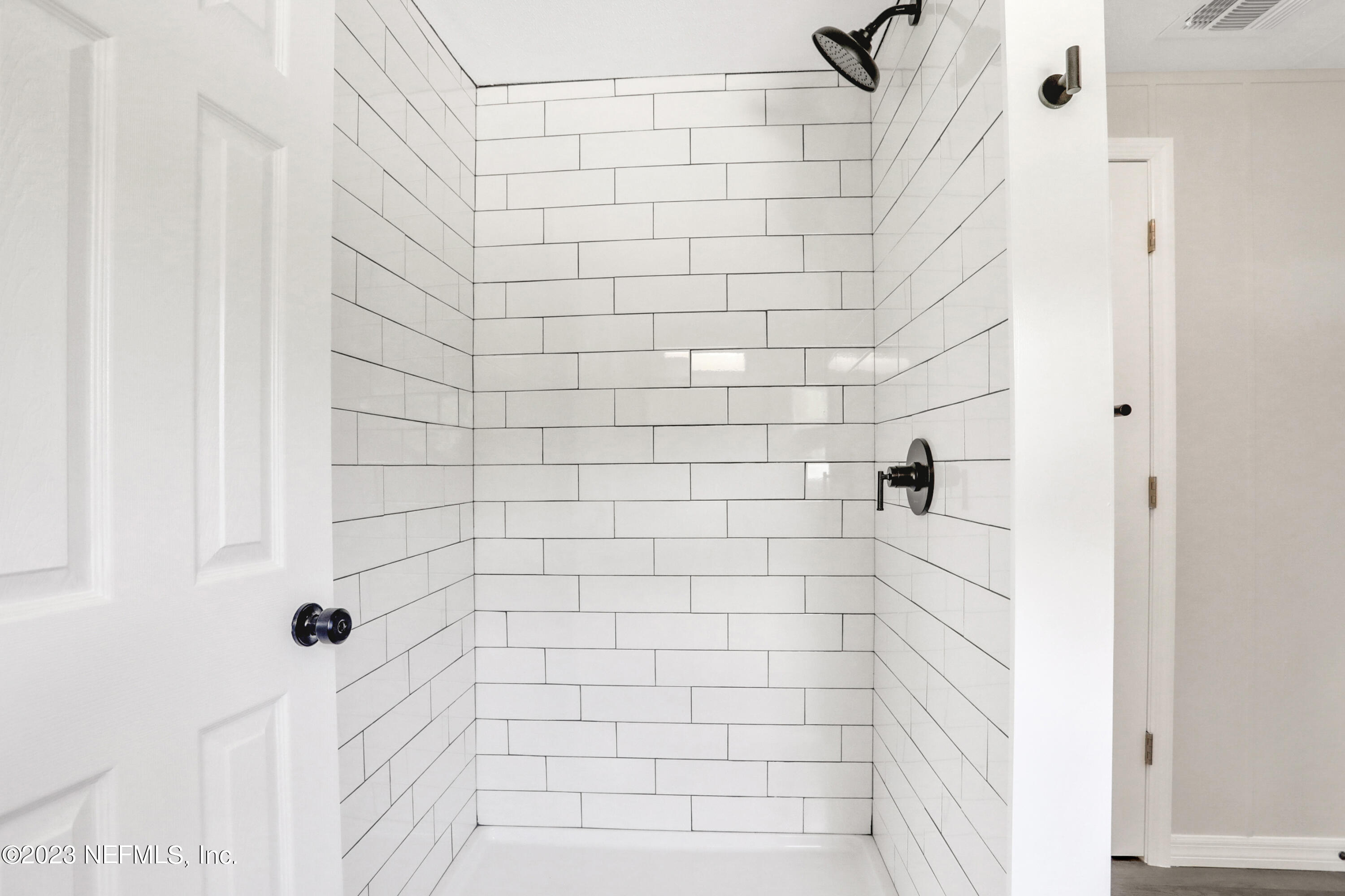 10765 Boddens Road Jacksonville, FL 32219 - Photo 29 of 39 a bathroom with a shower