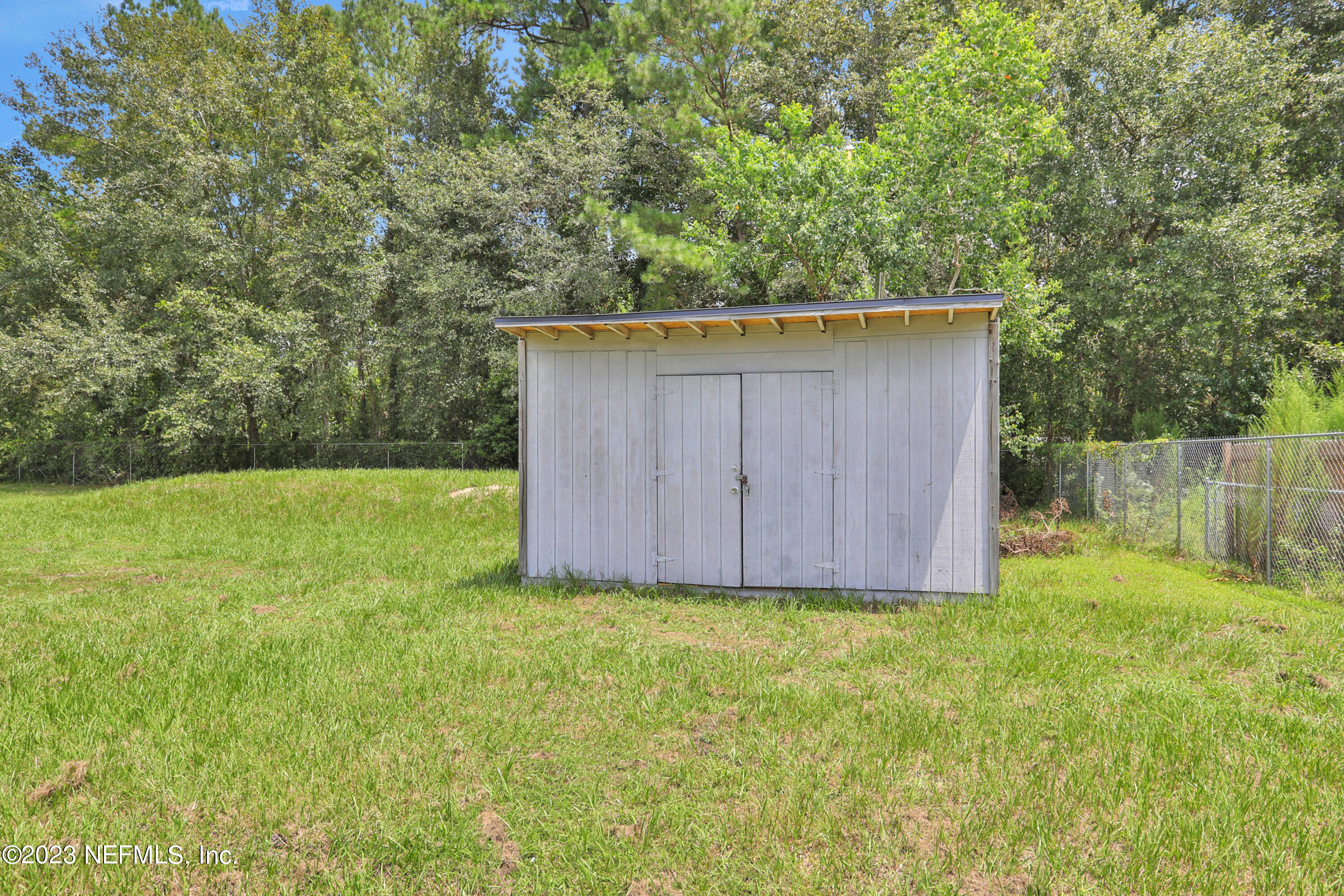 10765 Boddens Road Jacksonville, FL 32219 - Photo 35 of 39 a view of backyard with green space