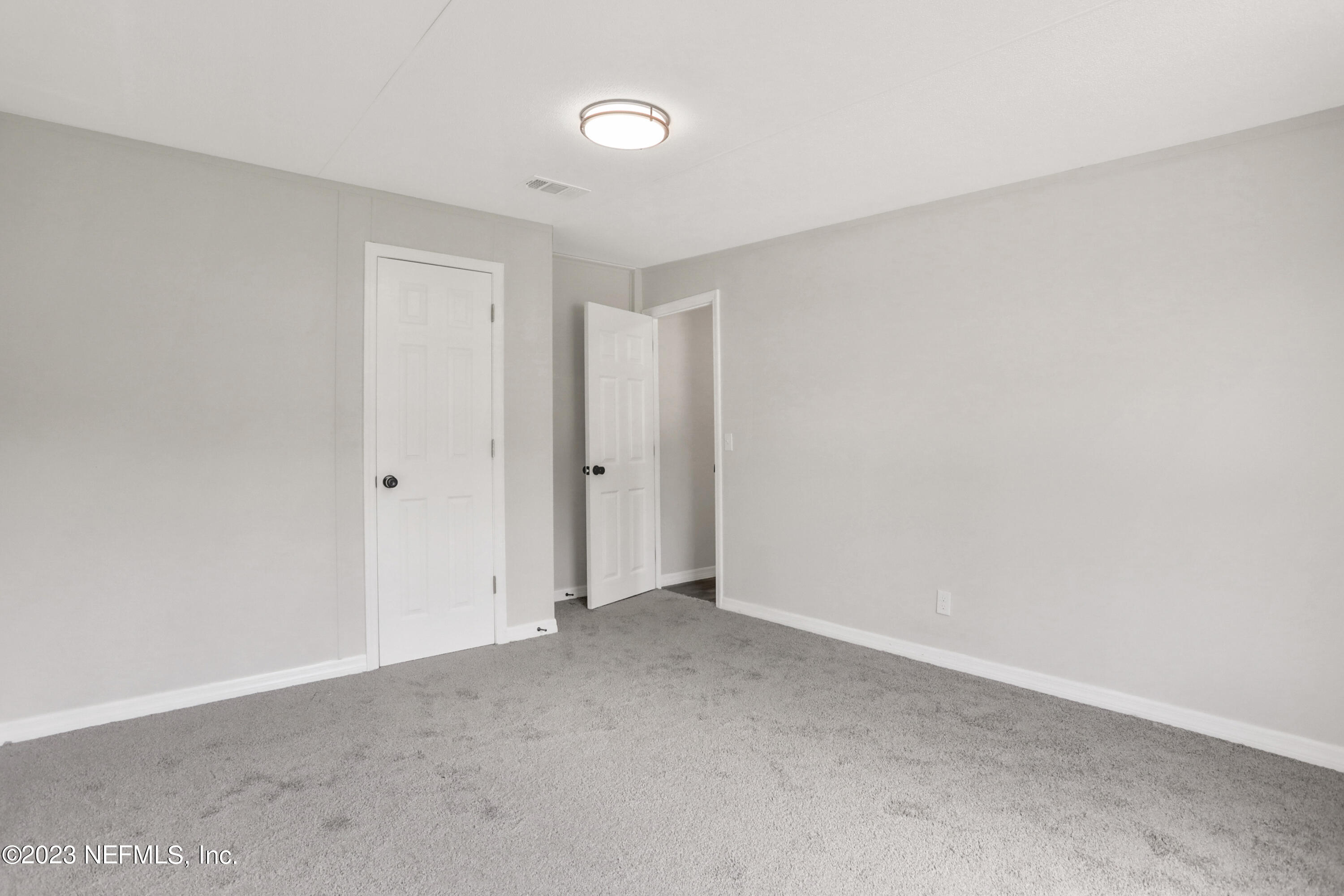 10765 Boddens Road Jacksonville, FL 32219 - Photo 9 of 39 a view of an empty room