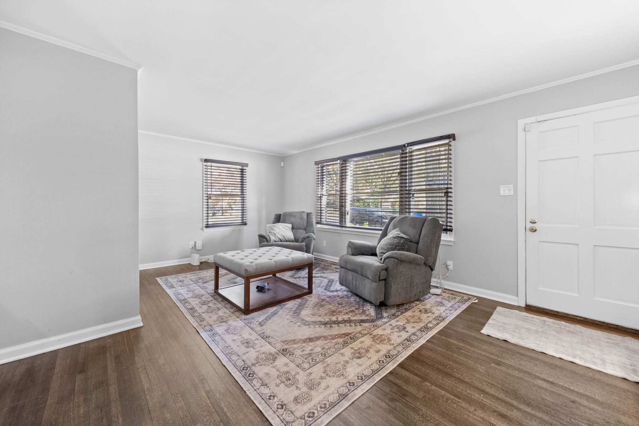 1435 Flamingo Road Memphis, TN 38117 - Photo 2 of 29 a living room with furniture and wooden floor