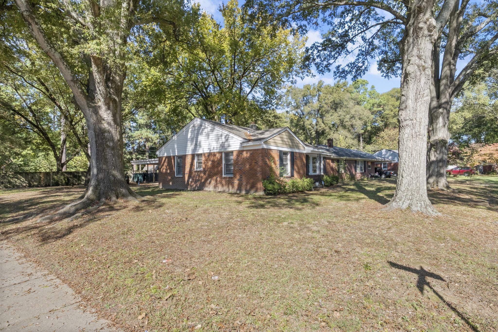 1435 Flamingo Road Memphis, TN 38117 - Photo 29 of 29 a front view of a house with a yard