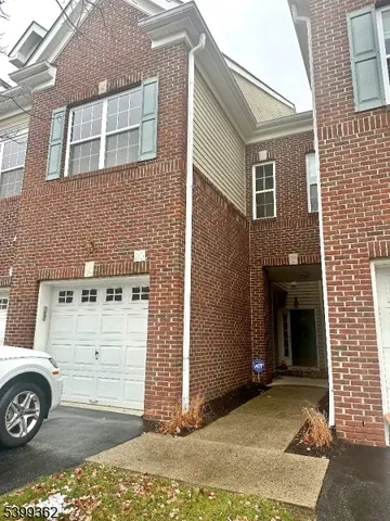 a front view of a house with a porch