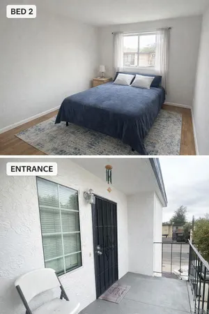 a view of a bedroom with furniture and window