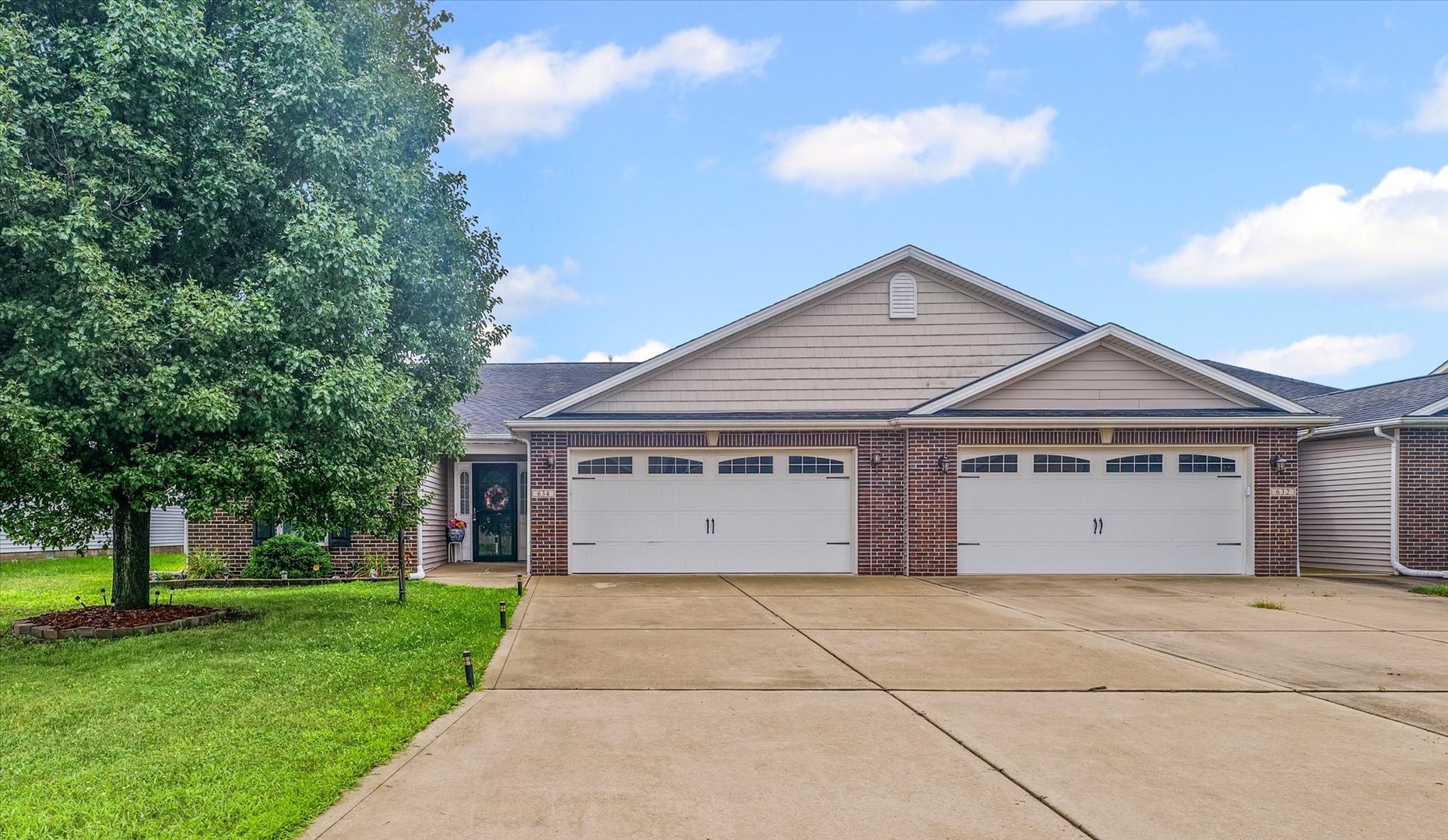 634 Sedgegrass Drive Champaign, IL 61822 - Photo 1 of 35 a view of garage and yard