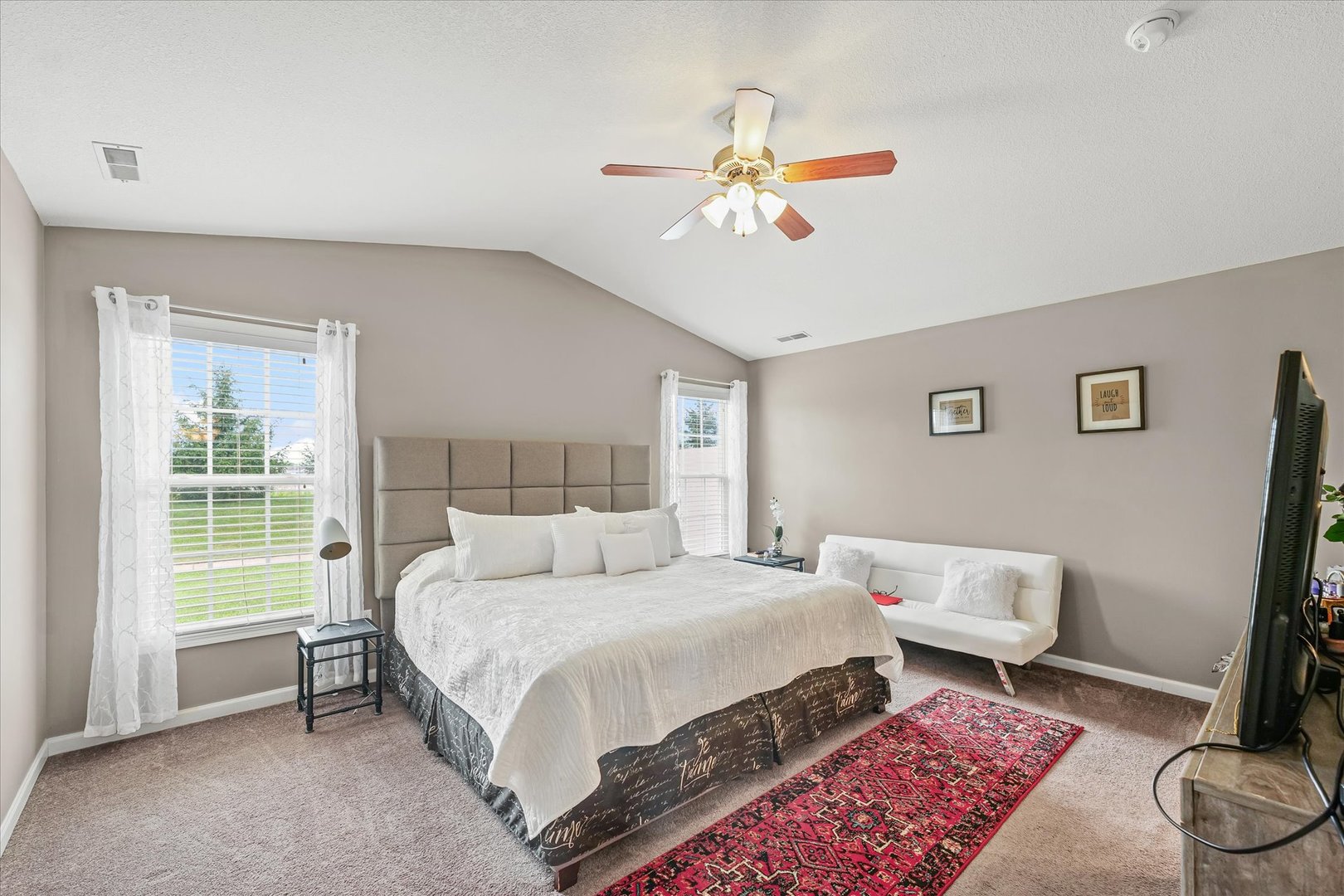 634 Sedgegrass Drive Champaign, IL 61822 - Photo 19 of 35 a bedroom with a bed and a chandelier