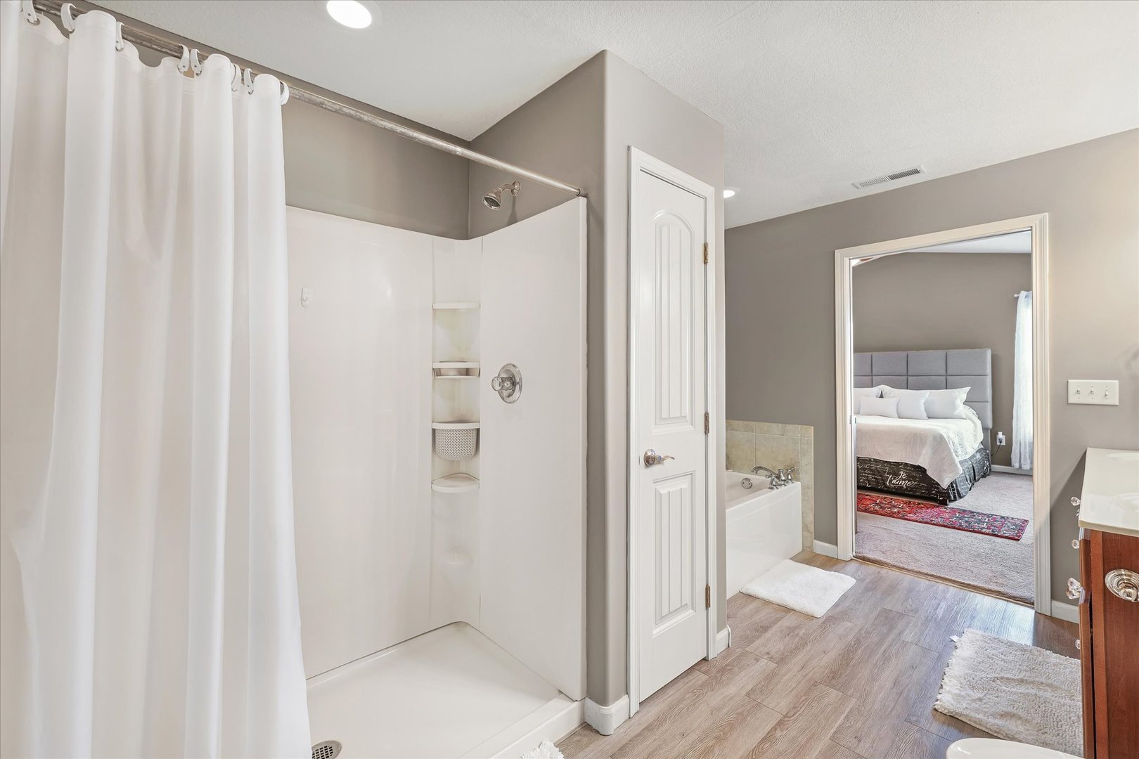 634 Sedgegrass Drive Champaign, IL 61822 - Photo 22 of 35 a bathroom with a glass shower door and a sink