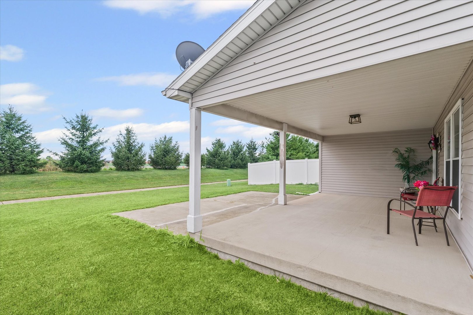 634 Sedgegrass Drive Champaign, IL 61822 - Photo 30 of 35 a view of a house with a yard