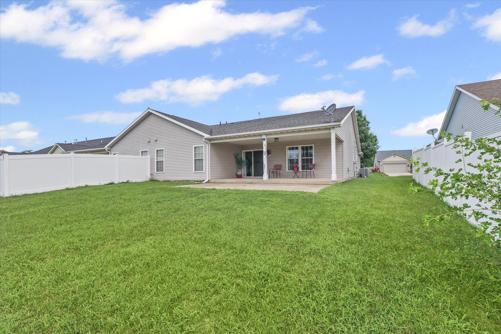 634 Sedgegrass Drive Champaign, IL 61822 - Photo 31 of 35 a view of a house with a backyard