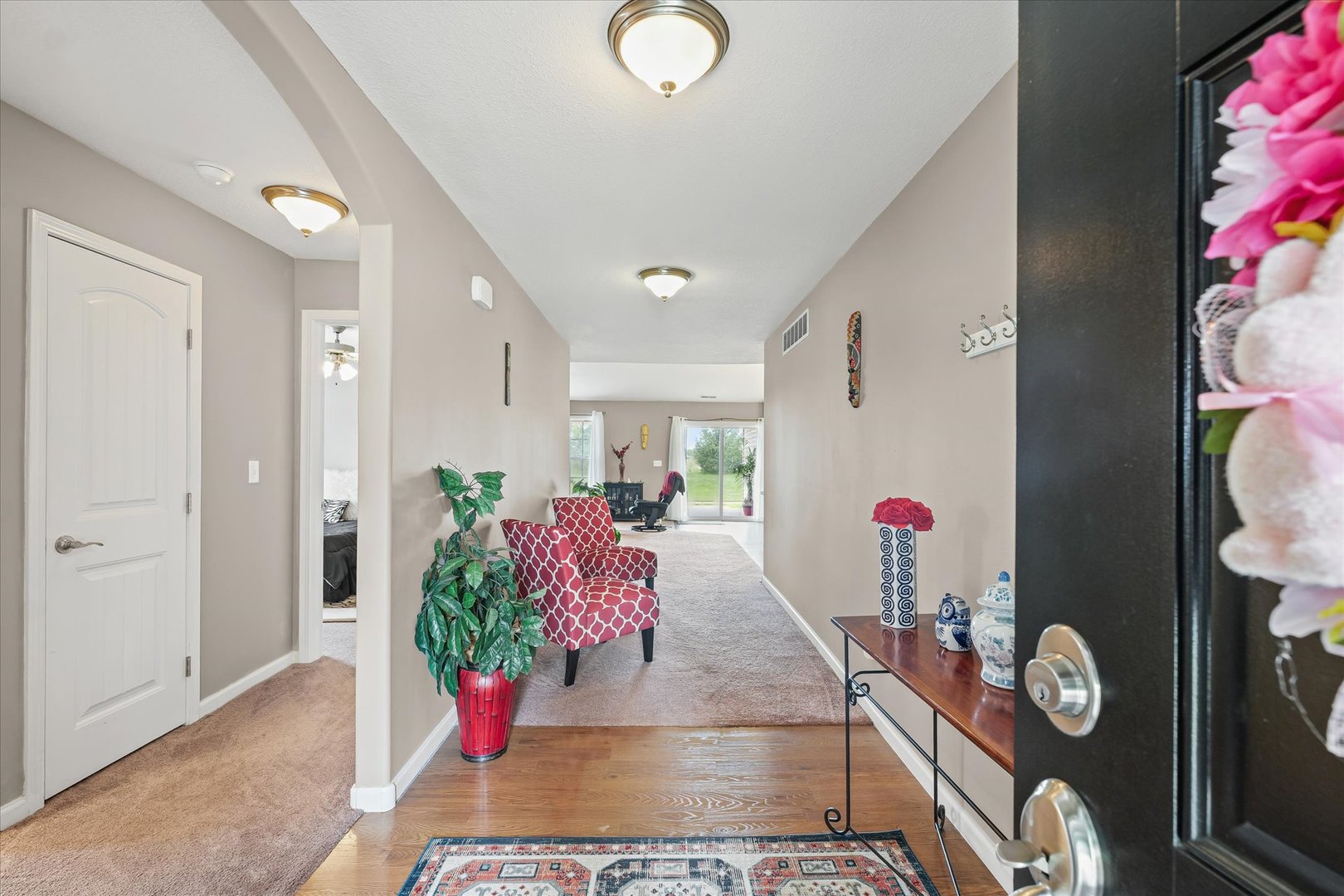 634 Sedgegrass Drive Champaign, IL 61822 - Photo 6 of 35 a living room with furniture and flowers