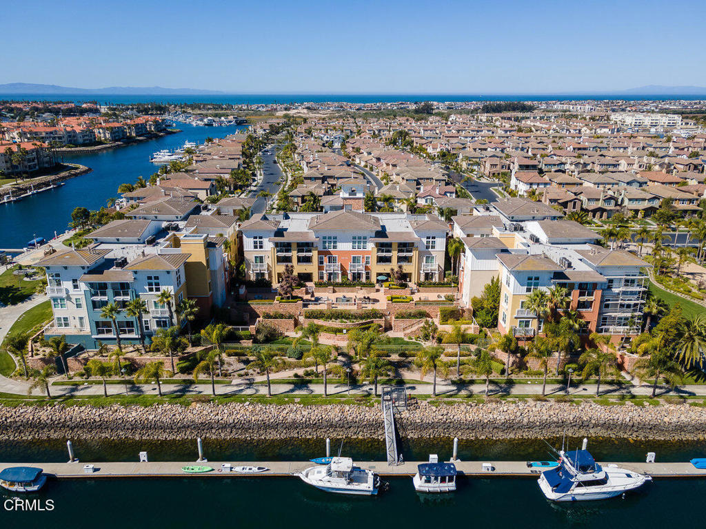 1544 Seabridge Lane Oxnard, CA 93035 - Photo 1 of 30 an aerial view of residential houses with outdoor space
