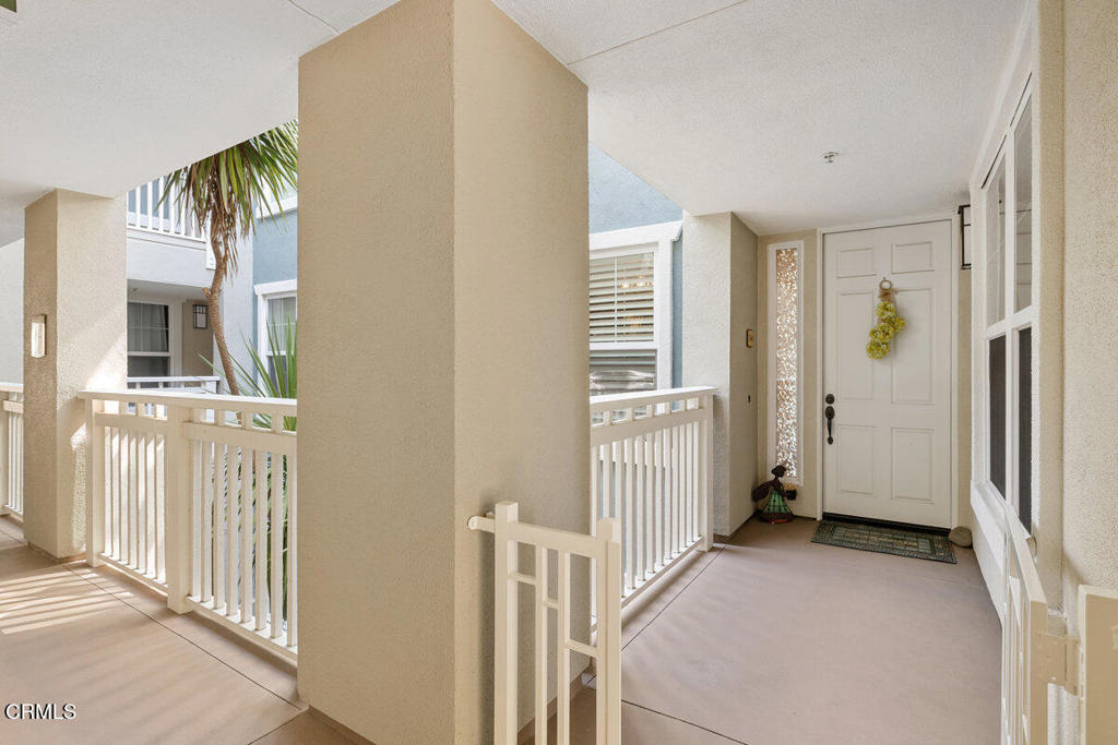 1544 Seabridge Lane Oxnard, CA 93035 - Photo 27 of 30 a view of a bedroom with wooden floor and windows