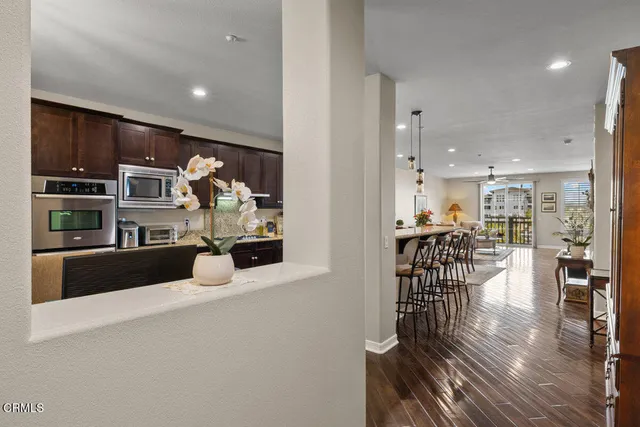 a view of a kitchen and dining room