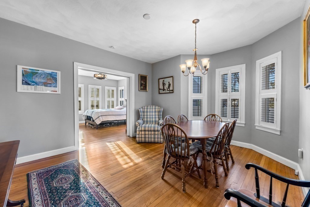 29-31 Middlesex Street, Unit 1 Chelmsford, MA 01863 - Photo 13 of 31 a view of a dining room with furniture window and wooden floor
