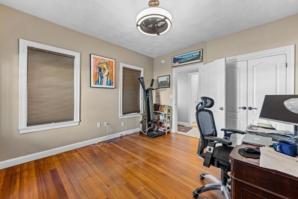 29-31 Middlesex Street, Unit 1 Chelmsford, MA 01863 - Photo 21 of 31 a view of a workspace with furniture and a window