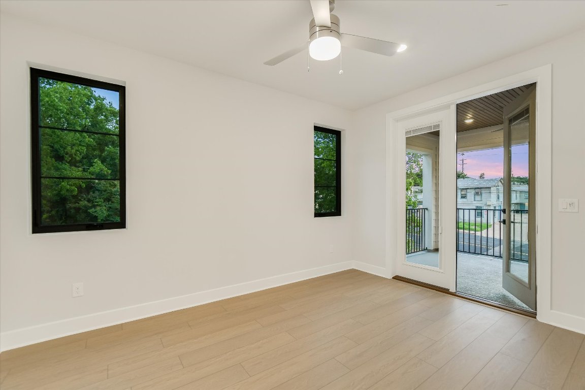 114 Lightsey Road, Unit 1 Austin, TX 78704 - Photo 23 of 25 an empty room with windows