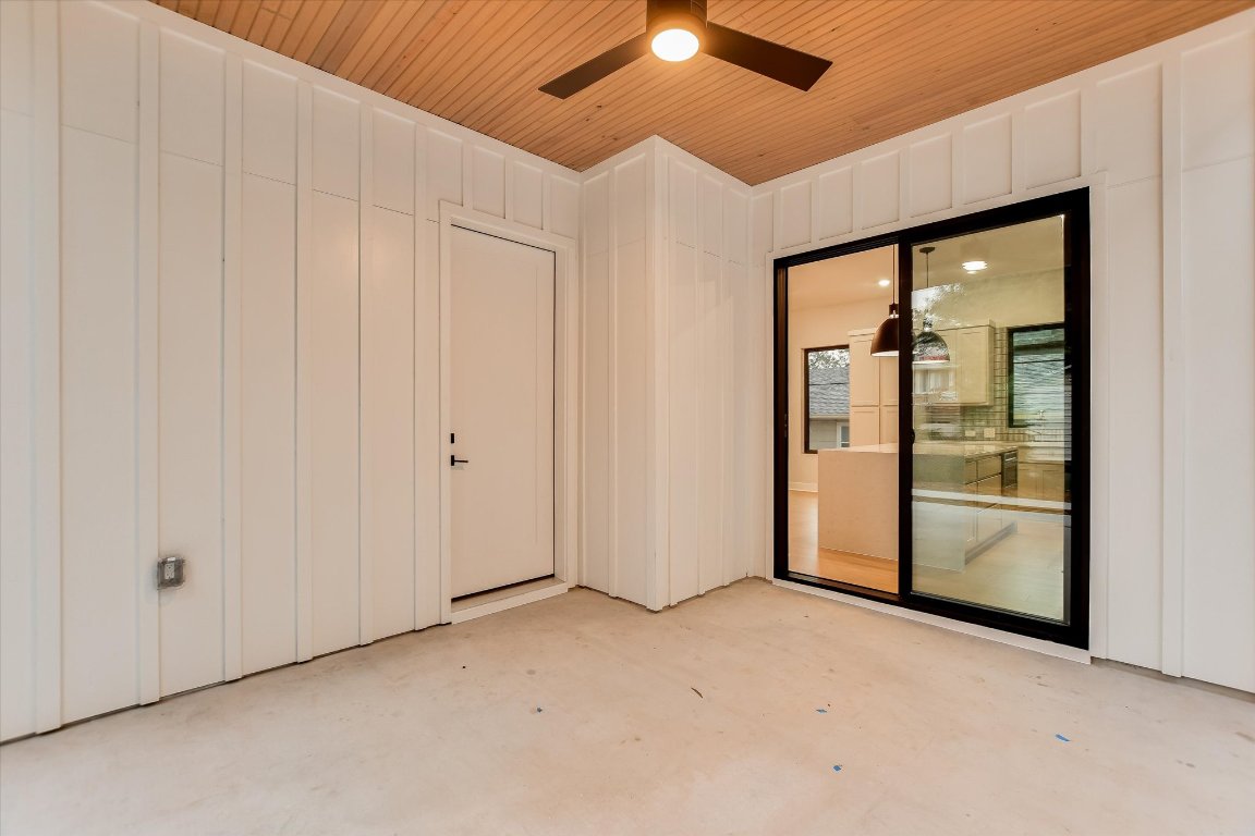 114 Lightsey Road, Unit 1 Austin, TX 78704 - Photo 25 of 25 an empty room with chandelier fan