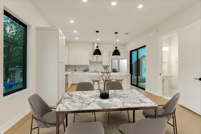a view of a dining room with furniture
