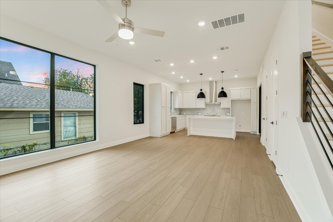114 Lightsey Road, Unit 1 Austin, TX 78704 - Photo 9 of 25 a view of an empty room with a fireplace