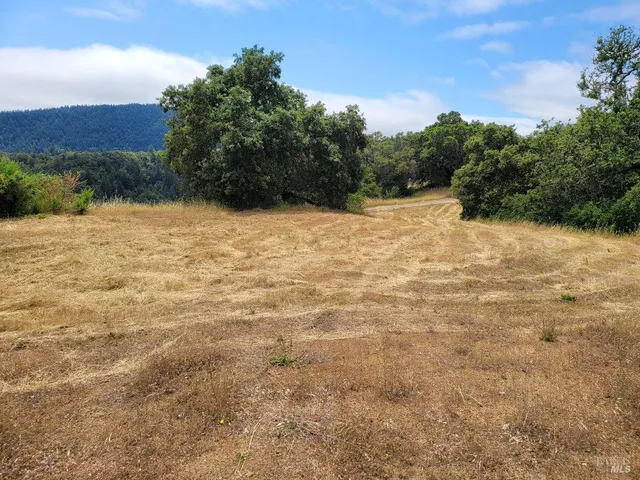 a view of empty room with mountain view