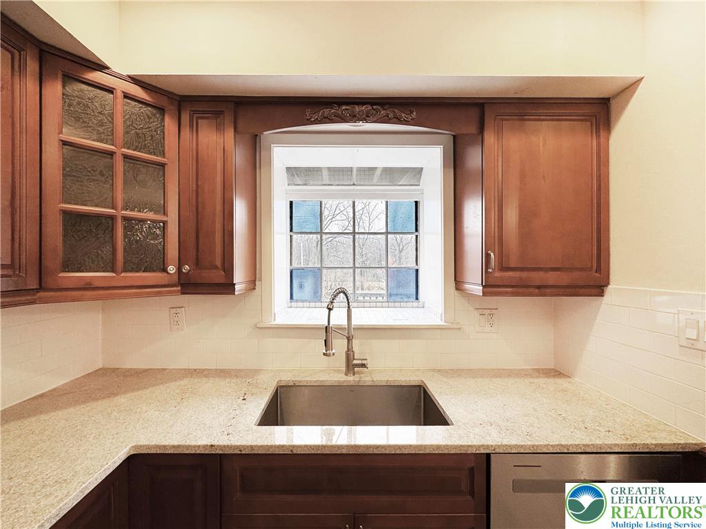190 Front Street Hellertown, PA 18055 - Photo 6 of 19 a close view of a sink and dishwasher in a kitchen