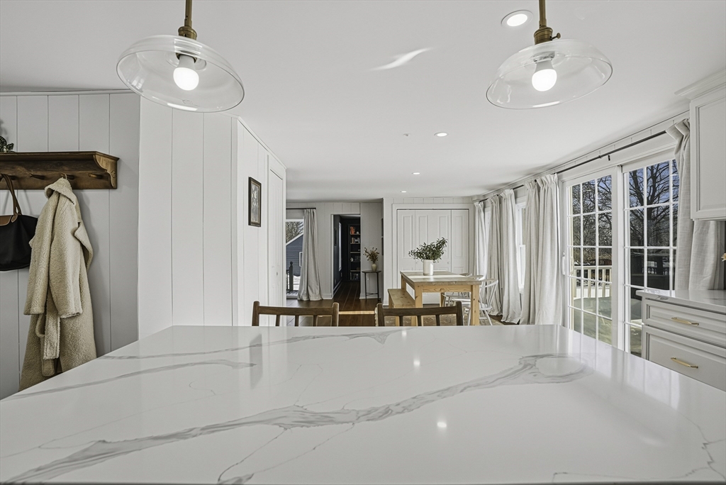 26 Maple Street Mendon, MA 01756 - Photo 13 of 42 a view of a livingroom with furniture and ceiling fan