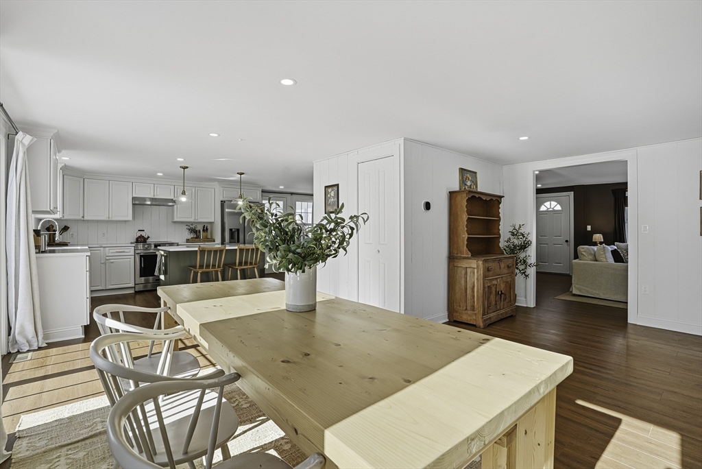 26 Maple Street Mendon, MA 01756 - Photo 14 of 42 a living room with furniture and kitchen view